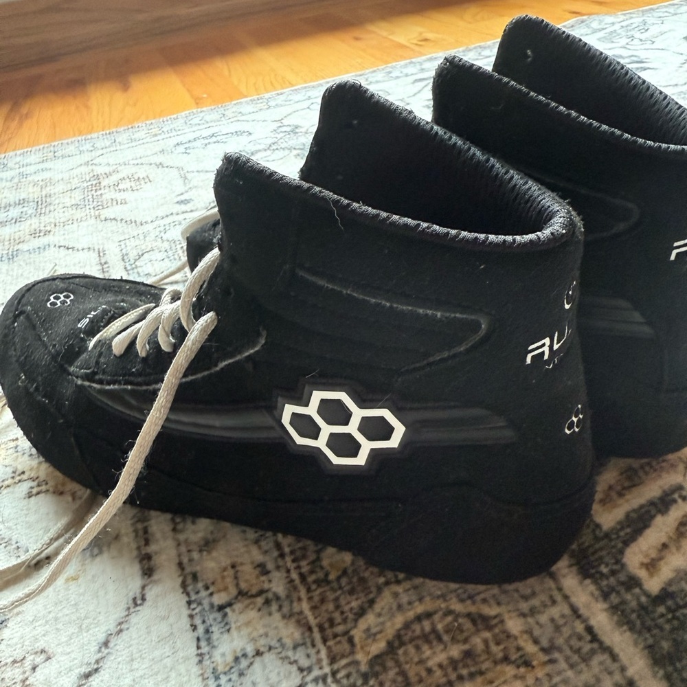 Rudis wrestling shoes, men’s 8.5, in good condition.